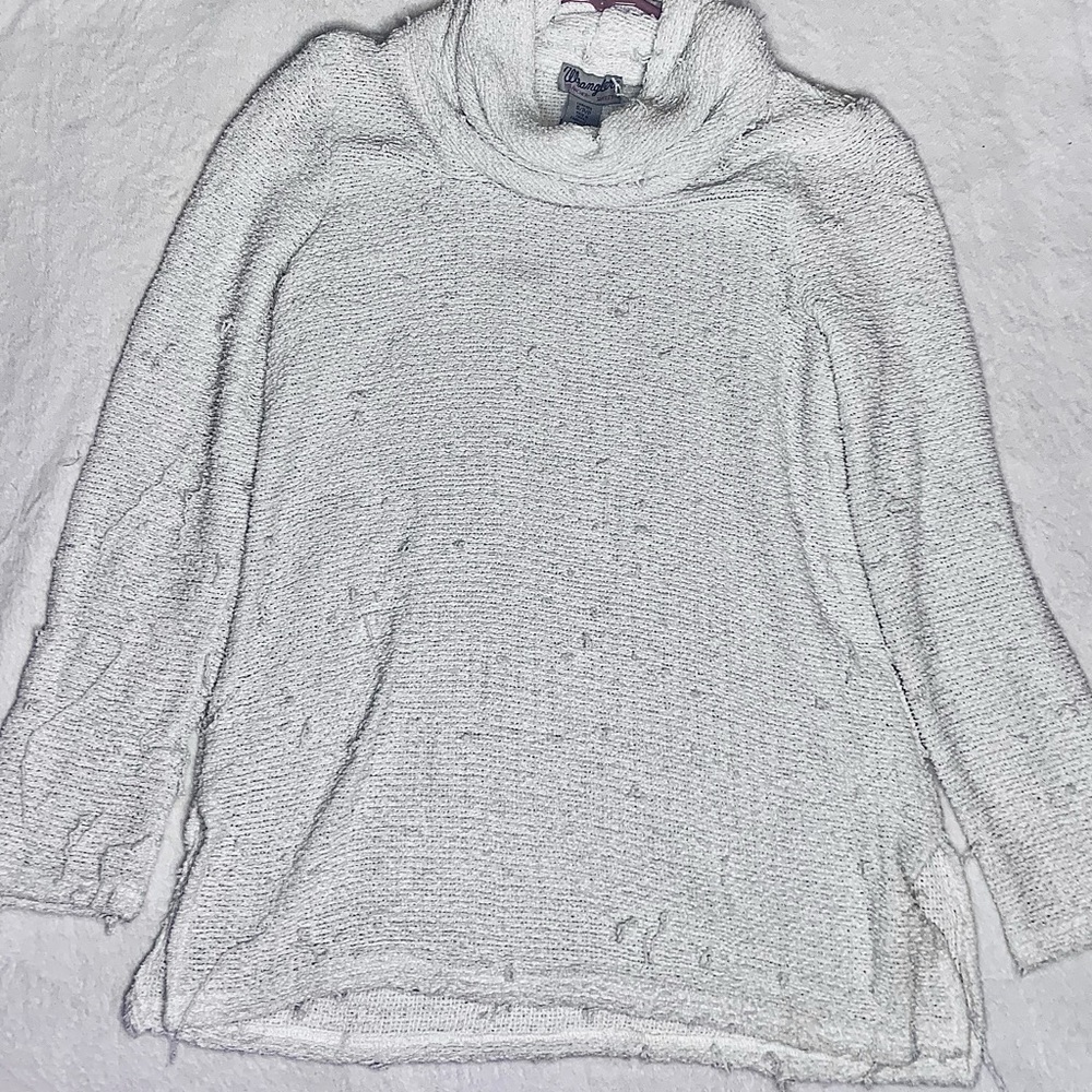 This is a white polyester sweater from wrangler size small only worn once